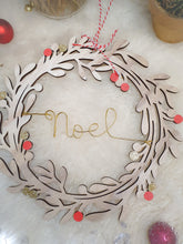 Load image into Gallery viewer, Christmas wreath decoration customizable family name wreath of leaves and wooden mistletoe pompoms to hang on a door, wall
