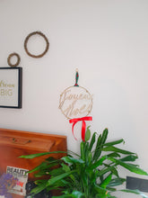 Load image into Gallery viewer, Merry Christmas wreath decoration to hang on a door, wall, wood and gold metal, red ribbon and Scottish tartan, glitter mistletoe balls
